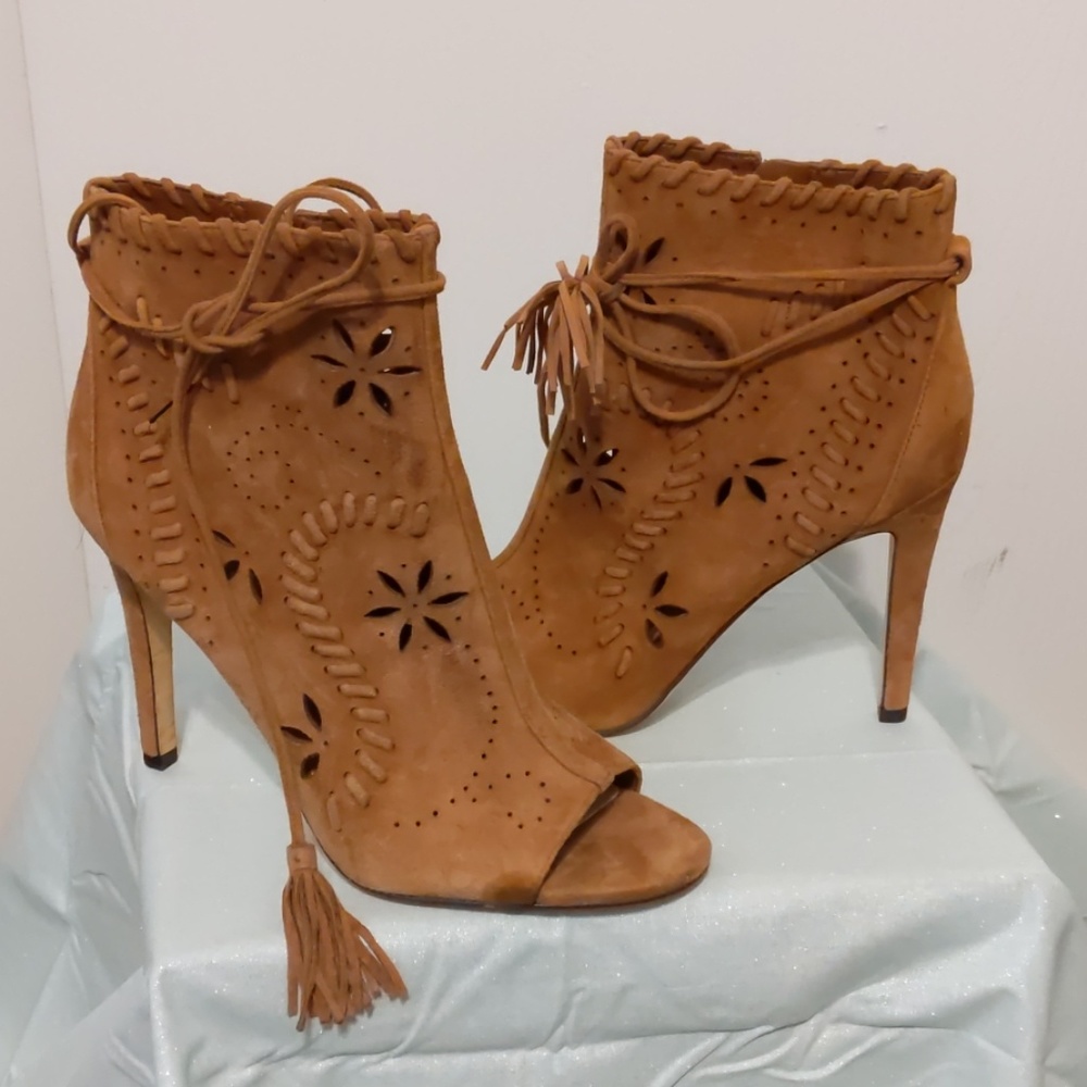 Ankle boots (left boot missing one tassle)